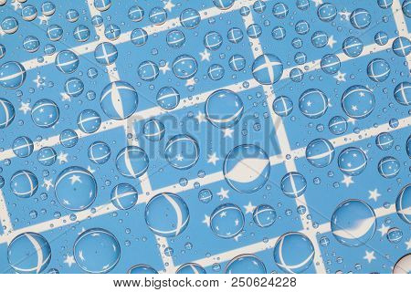 Flags Of Micronesia Behind A Glass Covered With Rain Drops.pattern From Flags Of Micronesia. 3d Illu