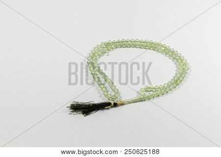 Close-up Shot Of Circled Handmade Transparent Green Stone Islamic Prayer Beads