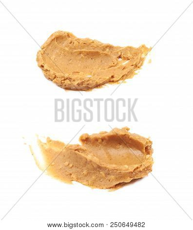 Peanut Butter Spread Isolated Over The White Background, Set Of Two Different Foreshortenings