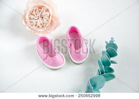 Shoes Pink And Flowers For Handmade Dolls. Fashion Concept.
