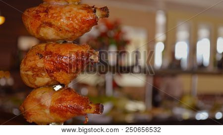 Chicken Thighs On Skewers Being Served In Carvery Of Noble Meats