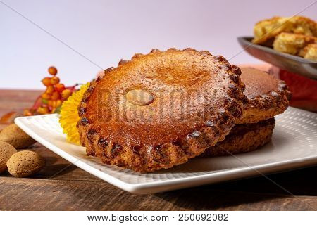 Round Dutch Homemade Cookies Filled With Marzipan And Almonds Nuts, Autumn And Winter Seasonal Desse