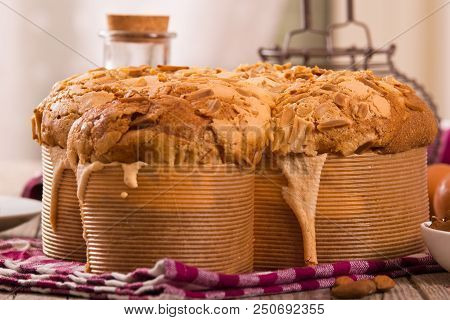Easter Dove Bread (colomba Pasquale) On Wooden Table.