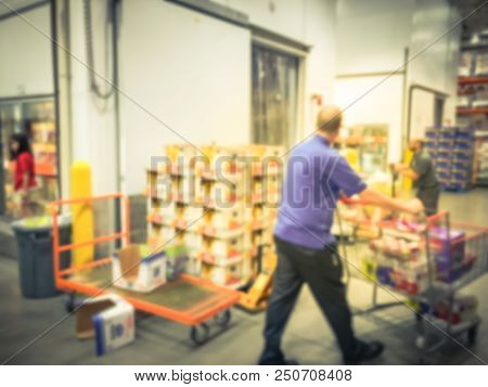 Customer Shopping In Wholesale Store Near Cold Storage Room