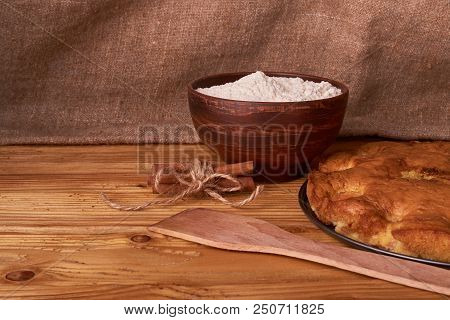 Apricot Cake With A Wooden Shovel On Wooden Background