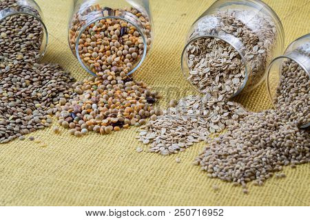 Glass Jars With Various Legumes - Beans, Oatmeal Flakes, Peas And Lentils. Cooking, Diet, Vegan And 