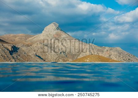 View From Pool At Mountaint And Blue Sky, Crete, Greece
