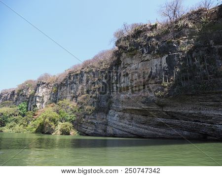 Rocky Cliff Of Sumidero Canyon At Grijalva River Landscapes In Chiapas State In Mexico With Clear Bl