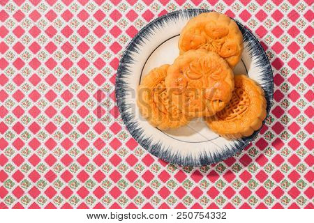 Vietnamese Sweet Food For Mid Autumn Festival When Full Moon, Moon Cake From Top View On Black Woode