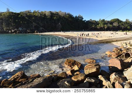 Shelly Beach And Cabbage Tree Bay Aquatic Reserve At Manly With Sand And Tasman Sea. People Relaxing
