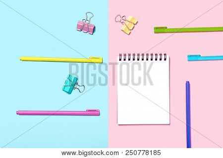 Empty Notebook Or Notepad On Blue And Pink Background. Various Pens. Creative Minimalism Chancery Co
