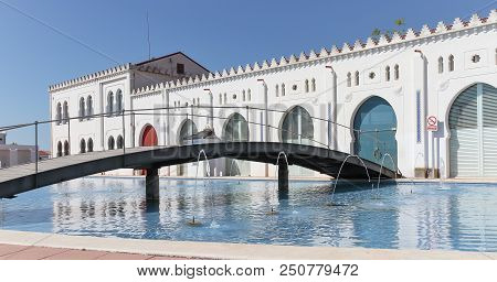 Horizontal Scene Of Back Facade Of Moruno Building With The Bridge And Pond In The City Of Castellon