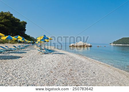 Sea Rocks At Calm And Crystal Clear Turquoise Water At Morning, Milia Beach, Island Of Skopelos, Gre