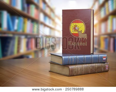 Learn Spanish concept. Spanish dictionary book or textbok with flag of Spain and cow on the cover in the library. 3d illustration