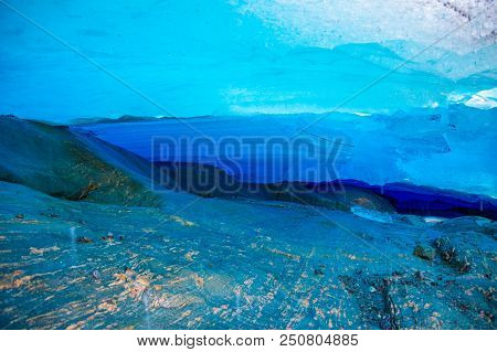 Blue Ice Cave Of Svartisen Glacier In Norway