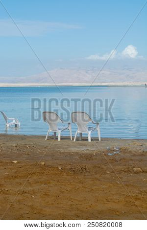 Chairs On Beach, Lowest Salty Lake In World Below Sea Level Dead Sea, Full Of Minerals Near Luxury V
