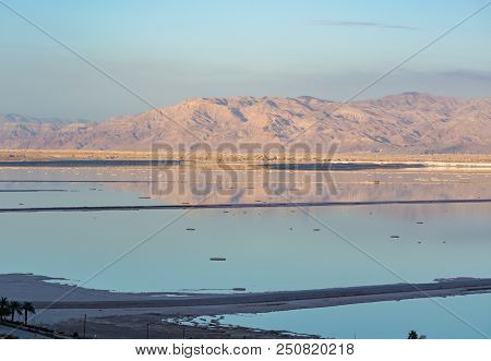 Sunset Over Lowest Salty Lake In World Below Sea Level Dead Sea, Full Of Minerals Near Luxury Vacati