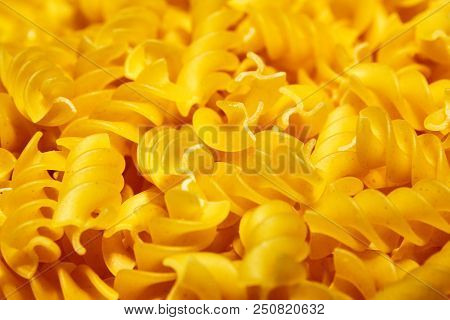 Raw Uncooked Dry Italian Fusilli Pasta. Corkscrew Spiral Shape