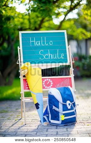 School Beginning Concept. Satchel And Schoolbag, Backpack, Desk And Traditional German School Cone W