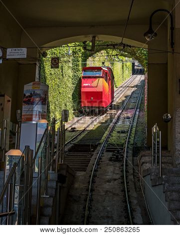Bergamo, Italy - May 10, 2018: Funiculare San Vigilio - Red Funicular In Old City Of Bergamo. The Fu