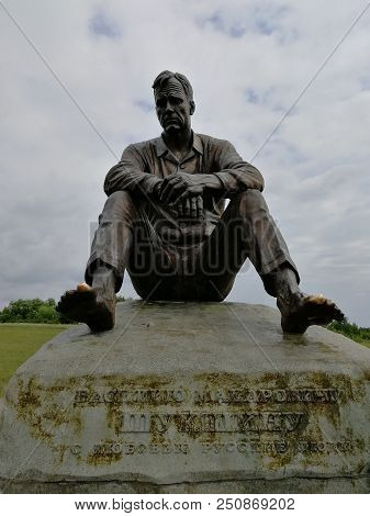 Srostki, Siberia, Altai Region, Russia - 24 July, 2018: Bronze Monument Of Soviet Writer Vasily Maka