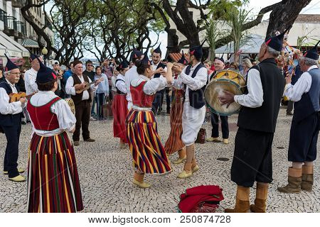 Funchal, Portugal - April 19, 2018:  Folk Musicians And Dancers Performing On The Avenida Arriaga  I
