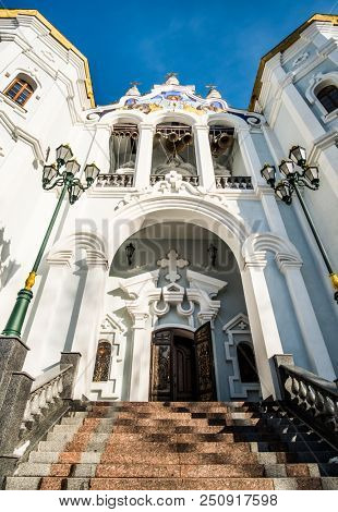 Kharkiv, Ukraine - 13 March 2018: Enter in Mironosickaya church under blue sky in Kharkiv