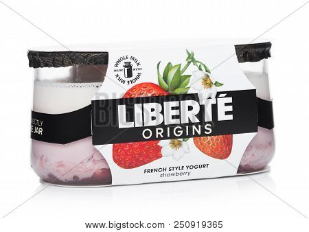 London, Uk - July 28, 2018: Pack Of Liberte Origins French Style Yogurt With Strawberries Flavour On