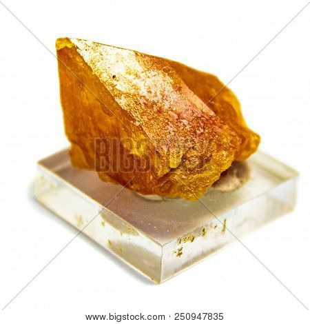 Natural Mineral Sheelite On Stand On White Background