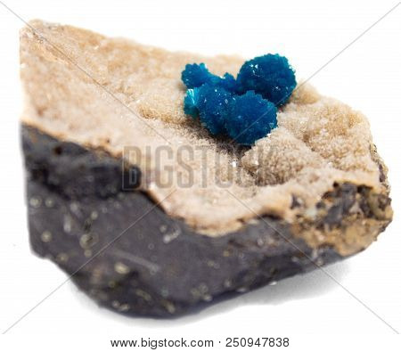 Natural Cluster Blue Cavansite On A White Background