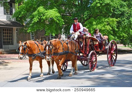 Williamsburg, Va, Usa - May 7, 2012: Horse Drawn Carriage Tours In British Colony In Williamsburg, V