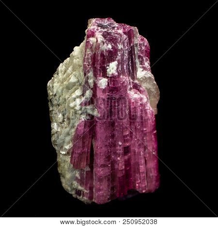 Natural Mineral Elbaite Tourmaline Natural Cut On A Black Background