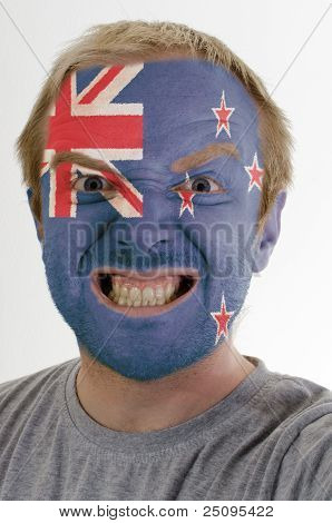 Face Of Crazy Angry Man Painted In Colors Of New Zealand Flag