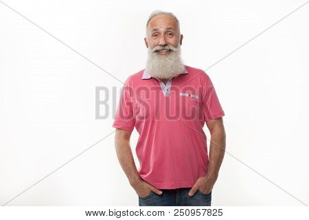 Optimistic Old Bearded Man Smiles Broadly, Shows White Perfect Teeth. Positive Emotions, Facial Expr