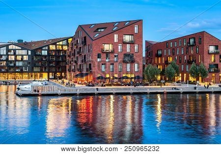 Kroyers Plads Buildings Of Modern Architecture Design By Embankment Illuminated At Night, Copenhagen