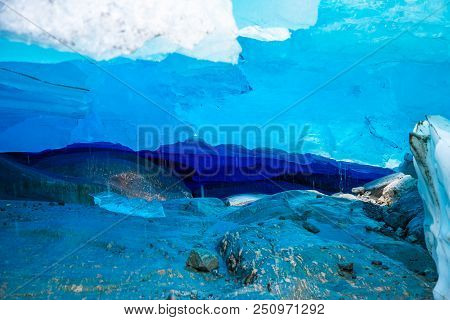 Blue Ice Cave Of Svartisen Glacier In Norway