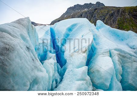 Part Of Blue Svartisen Glacier In Norway