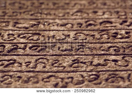Sinhalese Language Stone Book On Wall Of 12th Century Stone Hindu Structure. Polonnaruwa, Sri Lanka.