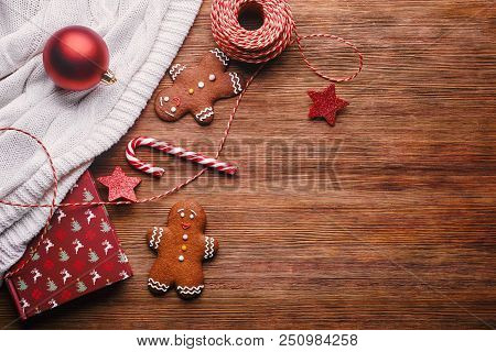 Gingerman Cookies, Lollipop, Christmas Decoration On Wooden Backgorun