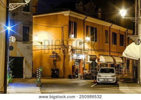 Ferrara, Italy - July, 23, 2018: cars parked in Ferrara, Italy, at night