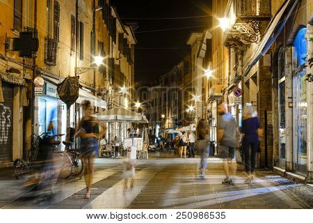 Ferrara, Italy - July, 23, 2018: street in the historical center of Ferrara at a night