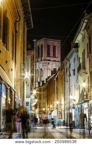 Ferrara, Italy - July, 23, 2018: street in the historical center of Ferrara at a night