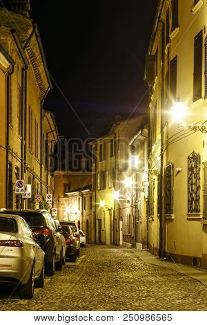 Ferrara, Italy - July, 23, 2018: cars parked in Ferrara, Italy, at night