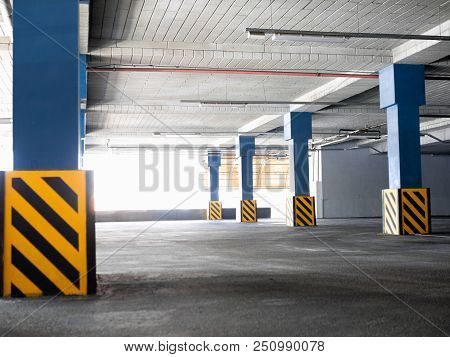 Empty Underground Parking Background With Copy Space. Economy Of Land Resourses Concept.