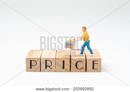 Promotion And Pricing For Marketing Commerce Concept, Miniature Figurine Trolly Shopping Cart With F