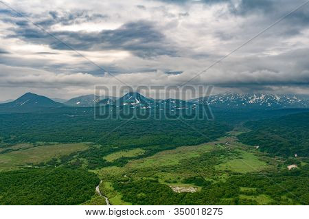 Panoramic View Of The City Petropavlovsk-kamchatsky And Volcanoes: Koryaksky Volcano, Avacha Volcano