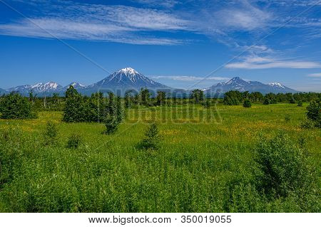 Panoramic View Of The City Petropavlovsk-kamchatsky And Volcanoes: Koryaksky Volcano, Avacha Volcano
