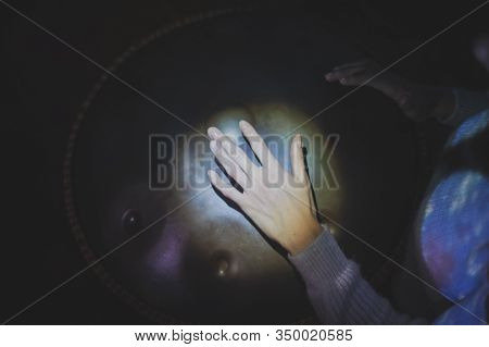 Beautiful Girls Hands Play Music On Hang