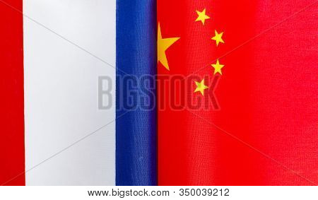 Fragments Of National Flags Of France And China Close-up