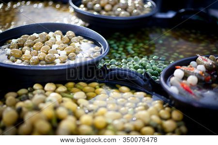 Bying Olives In Spain During A Local Market